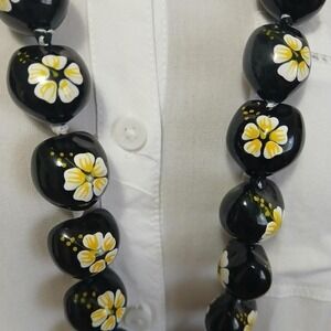 Handmade black, yellow and white Hawaiian floral necklace